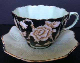 Paragon Green And Black Art Deco Cup And Saucer With White Wild Roses