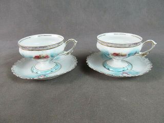 R.  S.  Prussia Mold 608 2 Footed Teacups & Saucers