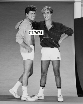 George Michael And Andrew Ridgeley Of Pop Duo Wham Pose For A Portrait Photo