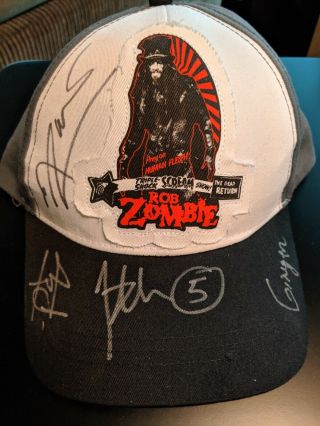 Rob Zombie Autographed Triple Shock Trucker Hat - Signed By Rob & Full Band