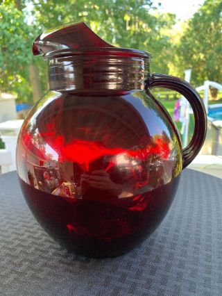 Ruby Red Glass Ball Shaped Water Pitcher Ice Lip.