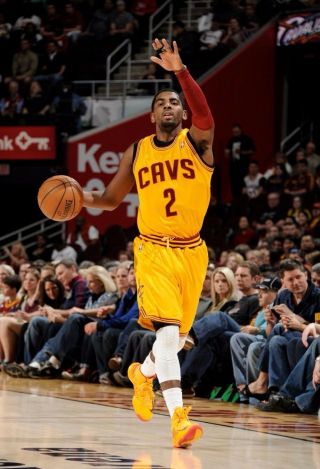 Kyrie Irving Raising Your Hand In The Game 8x10 Photo Print
