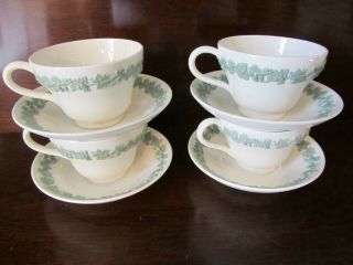 WEDGWOOD OF ETRURIA & BARLASTON EMBOSSED QUEEN ' S WARE 4CUP & SAUCER GREEN ON CRE 2