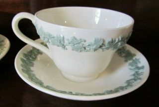WEDGWOOD OF ETRURIA & BARLASTON EMBOSSED QUEEN ' S WARE 4CUP & SAUCER GREEN ON CRE 3