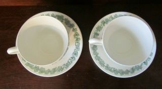 WEDGWOOD OF ETRURIA & BARLASTON EMBOSSED QUEEN ' S WARE 4CUP & SAUCER GREEN ON CRE 5