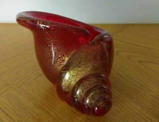 Studio Glass Conche Shell In Ruby Red With Gold Leaf Inclusions.