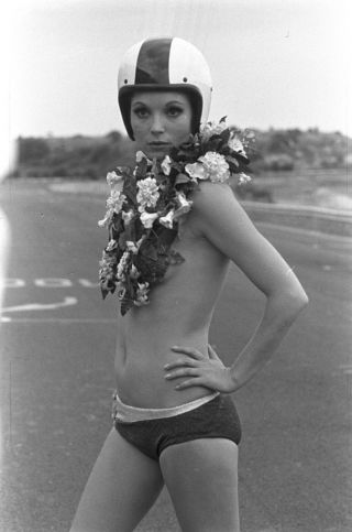 Elsa Martinelli With Necklace Of Flowers Covering Your Breasts 8x10 Photo Print
