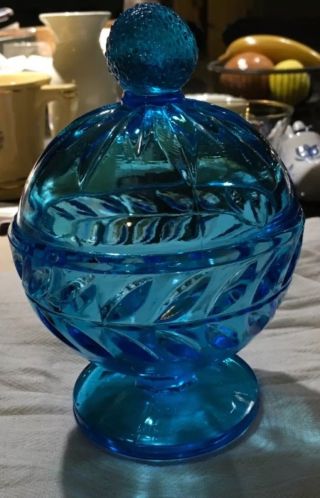 Blue Glass Covered Dish With Strawberry On Top Of Lid.  Love It