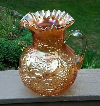 Dugan Carnival Glass Floral And Grape Marigold Pitcher