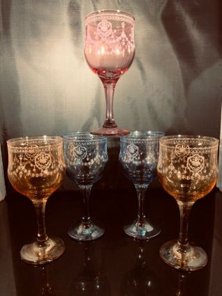 5 Vintage Italian wine glasses,  2 blue,  2 peach,  1 purple,  6 1/2” high 3