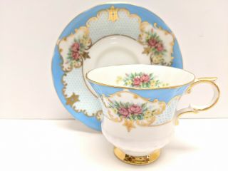 Rare Paragon Tea Cup And Saucer Set Burghley Stoke On Trent Blue Gold Rose