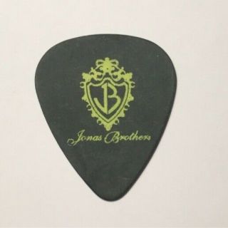 The Jonas Brothers Guitar Pick Joe Jonas Signature Pick.  Rare Tour,  Logo Pick