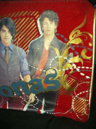 Jonas Brothers carrying zip up Bag with blue strap 3