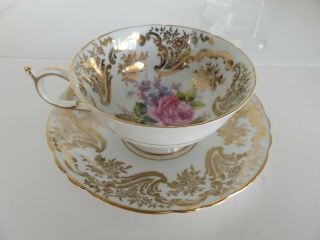 VINTAGE PARAGON ROSES CUP AND SAUCER ON A BLUE GREEN BACKGROUND 8