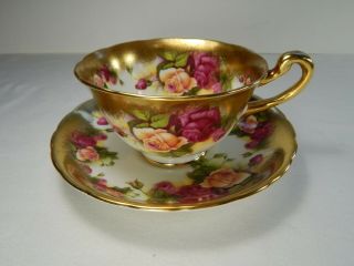 Royal Chelsea Tea Cup And Saucer Golden Rose Heavy Gold.
