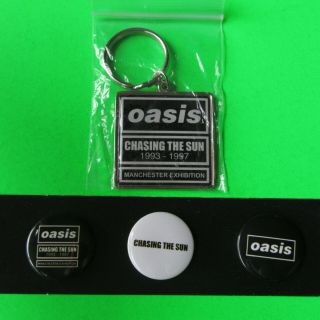 Oasis - Chasing The Sun (1993 - 1997) - Official Exhibition Badges & Keyring Set