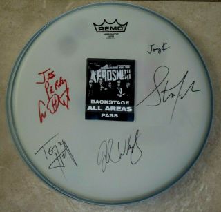 Aerosmith Group Signed Remo Drumhead With Backstage Pass