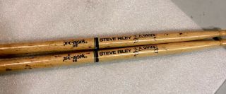 Steve Riley L.  A.  Guns,  Engraved Drumsticks In Concert Pro - Mark 2b