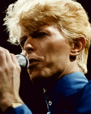 David Bowie Close - Up Pose In Blue Shirt In Concert 1980 