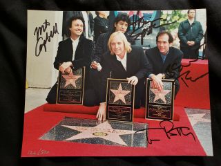 Tom Petty And The Heartbreakers Signed Photo By Lester Cohen