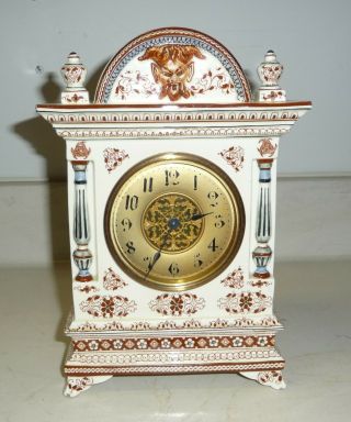 And Rare French Longwy 19th Century Porcelain Mantle Clock.