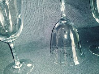 12 German Crystal Water/ Wine Long Stem Glasses.  Starburst etched.  Clear ringing 2