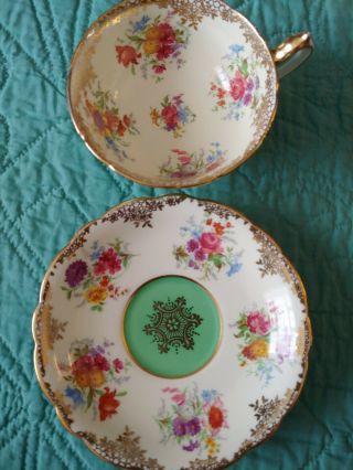 Paragon Double Warrant Teacup And Saucer Gold Lace And Green Bouquet