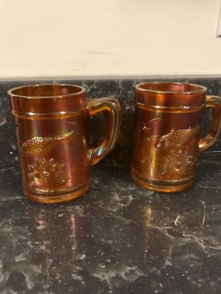2 Antique Carnival Glass Handled Mugs Marigold Color With Koi Fish & Cat Tails