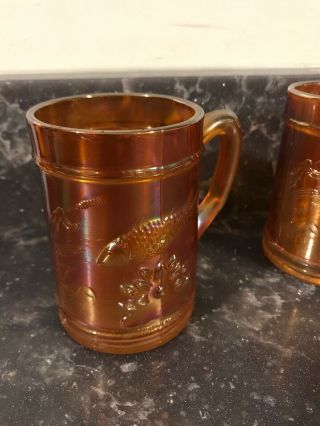 2 Antique Carnival Glass Handled Mugs Marigold Color With Koi Fish & Cat Tails 2
