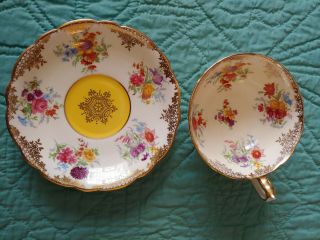 Paragon Double Warrant Teacup And Saucer Gold Lace And Yellow Floral