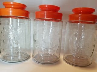 3 Vintage Anchor Hocking Clear Glass Jar Canister Lid Orange Winter,  Wheel,  Warf