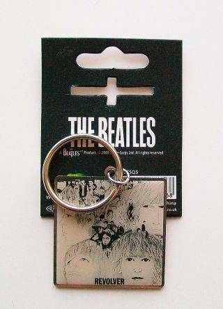 The Beatles Metal Keyring Displaying The Album Cover Of Revolver