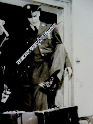 Photo - Army - Elvis Stepping Over Luggage Getting Off Of The Train