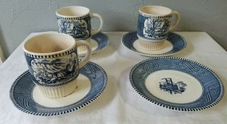 Four Royal China Currier & Ives Blue Saucers And Three Cups Or Mugs