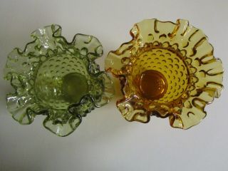 Fenton hobnail ruffled green vase and amber ruffled vase. 2