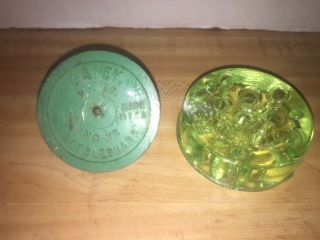 2 vintage flower frogs 1 uranium green glass 1 Dazey needlesharp metal 3