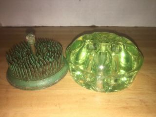 2 vintage flower frogs 1 uranium green glass 1 Dazey needlesharp metal 4