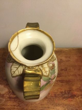 Antique hand painted Nippon Porcelain Vase w/ribbon handles 10.  5 