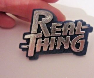 The Real Thing Vintage Shaped Plastic Pin Badge From The 1970 