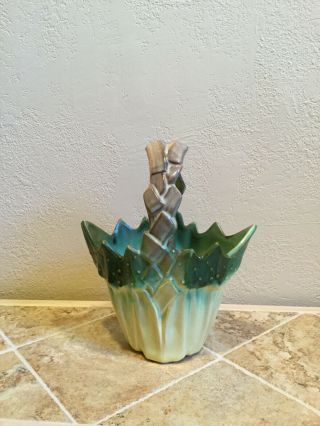 Hull Vase.  Cream Base Up To Green Jagged Leaf Top And Leaf Design Handle