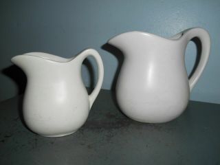 Set/2 Mccoy Pottery Matte Off White Pitchers - 1 1/2 Cup And 1 Quart