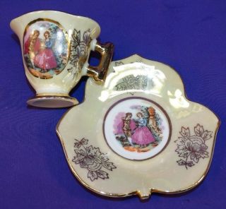 Vintage Porcelain Demitasse Cup & Saucer Set Courting Couple Opalescent & Gold