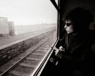 Bob Dylan Unsigned Photograph - L5278 - On The Train From Dublin To Belfast