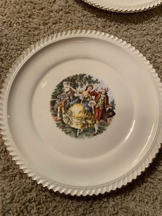 The Harker Pottery Co 22kt Gold Colonial Couple 4 10.  5” Dinner Plates