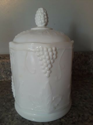 Vintage White Milk Glass Paneled Canister.  Grapes And Leaves Pattern.