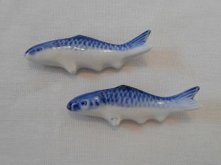 2 Antique Vintage Flow Blue Porcelain Figural Fish Chopstick Knife Fork Rests