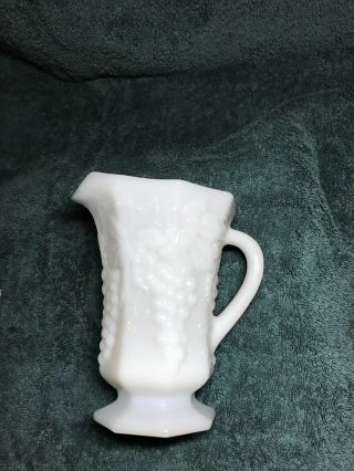 Vintage milk glass water pitcher with handle Grapes and Leaves 6 3/4 