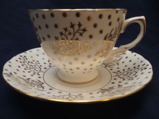 Vintage Royal Malvern Bone China England Tea Cup And Saucer Gold/white