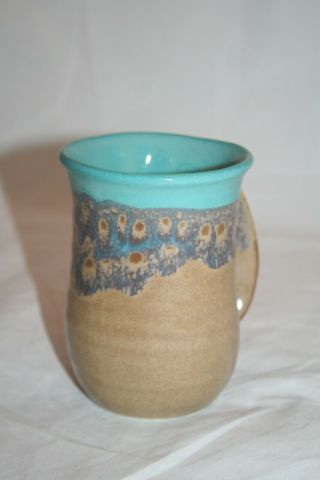 Clay in Motion Neher Pottery Hand Warmer Mug Coffee Cup Island Oasis Right Hand 3