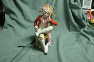 Antique Early Royal Dux,  Bohemia Figurine Colonial Man Sitting In Chair